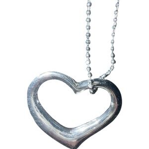 Elegant Silver Heart Pendant on a beaded Necklace